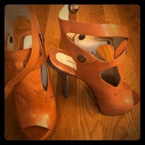 Designer Leather structural pumps